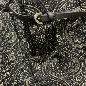 Women’s parsley capri pants, festive paisley design. Professional casual.